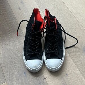 Stylish Black and Red High-Top Sneakers